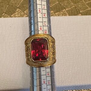 Elegant Gold Ring with Red Gemstone